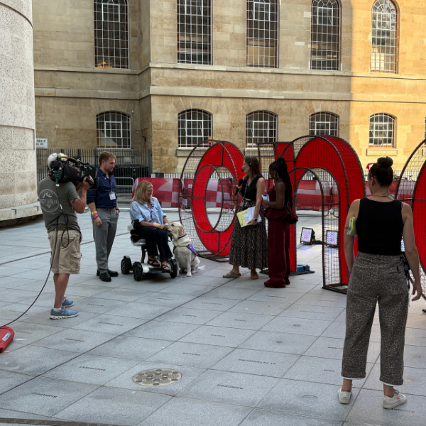 Photo showing outside studio set up with live camera