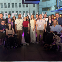 Big group photo of all one show presenters and guests on the show