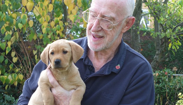 Puppy socialiser Roger with puppy Pixie
