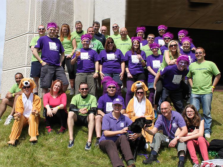 A Corporate Fundraising group wearing Canine Partners t-shirts