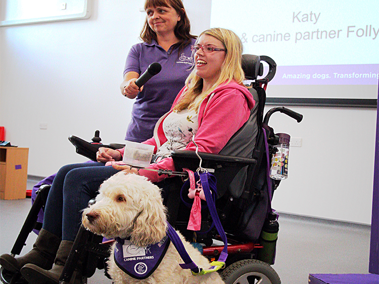 Partner Katy Evans giving a presentation for Canine Partners with Community Fundraising Manager Helen, raising awareness of the Charity