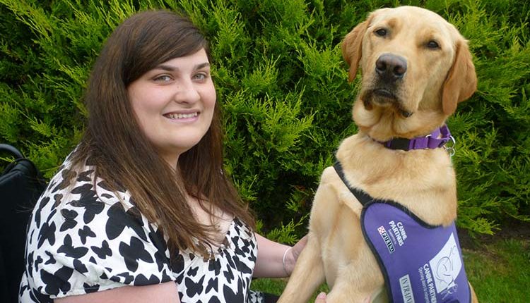 Partnership Clare and her assistance dog Griffin closeup