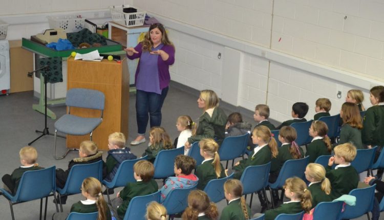 Education Officer Stacey Cullen talks to school children about Canine Partners