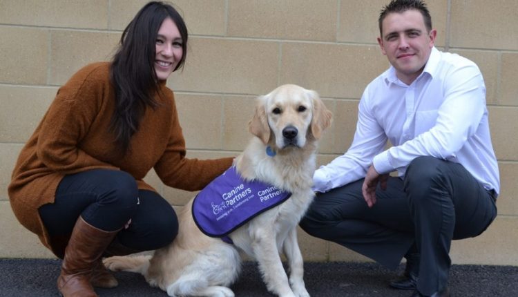 Staff from National Express meet sponsored dog Goldie