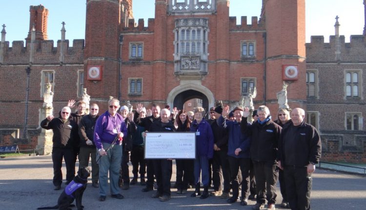 Hampton Court Palace cheque presentation with puppy in training Octavia