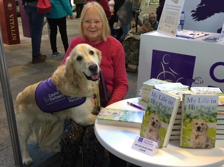 Wendy Hilling and canine partner Teddy at My Life in His Paws book signing