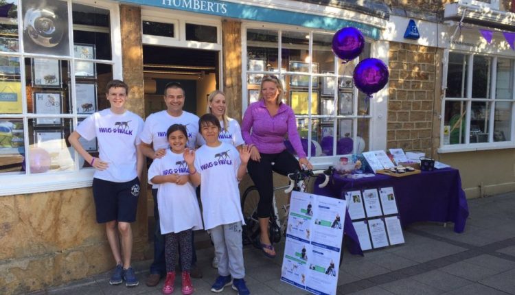 Humberts Yeoville team outside branch taking part in Great Humberts Cycle to raise money for Canine Partners