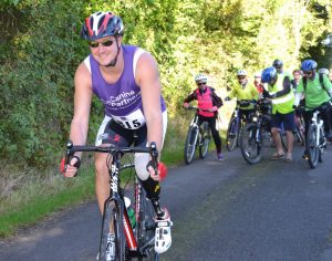 Paralympian Mike Goody cycling at Canine Partners Pedal for Paws event