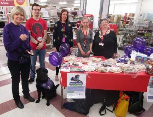 Puppy parent Jenny with puppy in training Gilly with Wilko Burgess Hill staff
