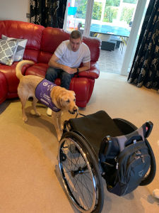 CP Tessie bringing David his wheelchair