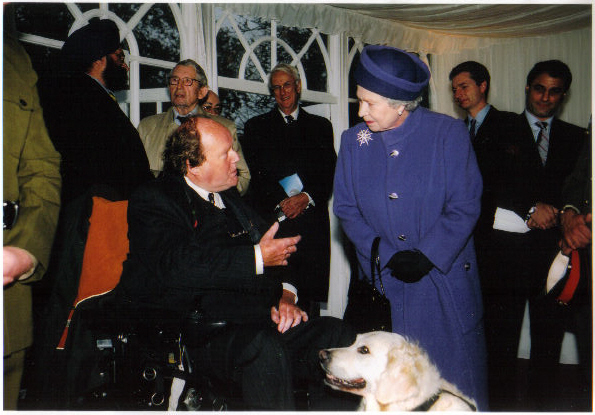 The Queen meeting partnership Gary and canine partner Gracie in June 2004