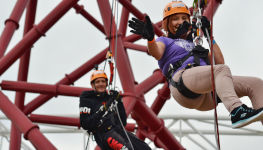 Two people abseiling at the ArcelorMittal Orbit